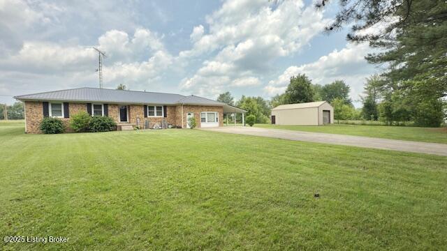 187 Glenn Rd, Leitchfield, KY 42754 - ranch-style home with concrete driveway, a front lawn, an outdoor structure, and brick siding