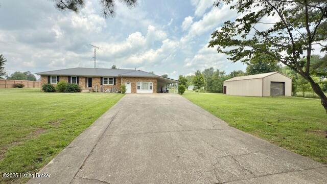 187 Glenn Rd, Leitchfield, KY 42754 - view of front facade with driveway, a front yard, an outdoor structure, and a carport