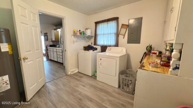 187 Glenn Rd, Leitchfield, KY 42754 - washroom featuring electric panel, separate washer and dryer, wood finished floors, and water heater