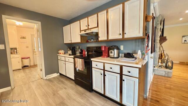 187 Glenn Rd, Leitchfield, KY 42754 - kitchen featuring black electric range oven, under cabinet range hood, light countertops, and light wood-style floors