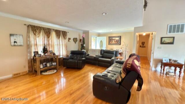 187 Glenn Rd, Leitchfield, KY 42754 - living room featuring crown molding and wood finished floors