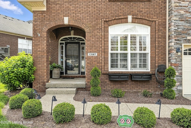 13127 Wilhoyte Ct Unit 13127, Prospect, KY 40059 - entrance to property featuring brick siding and a porch