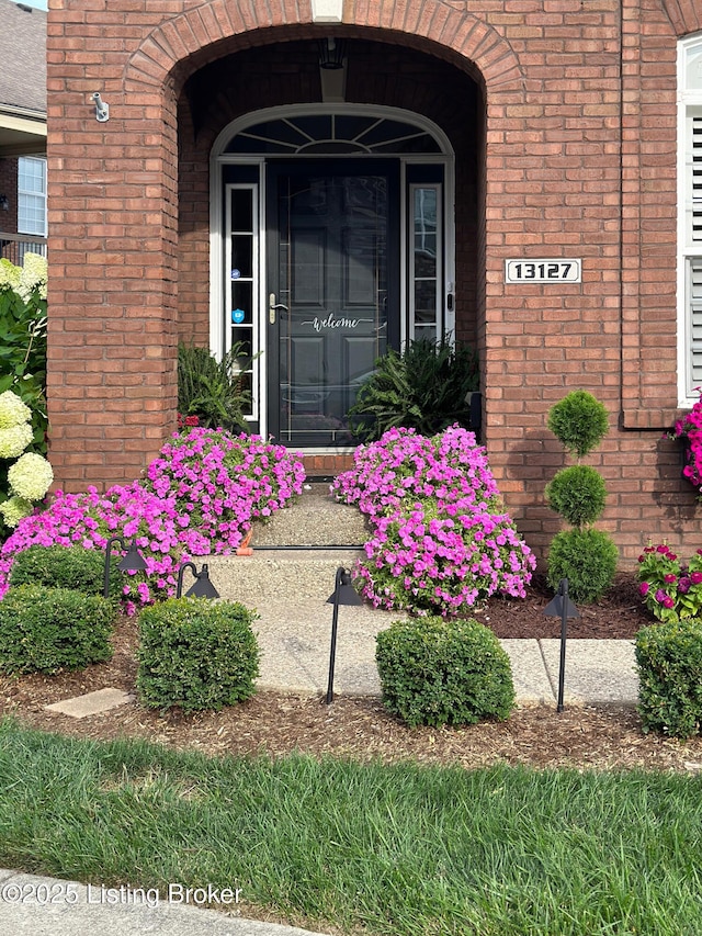 13127 Wilhoyte Ct Unit 13127, Prospect, KY 40059 - doorway to property featuring brick siding
