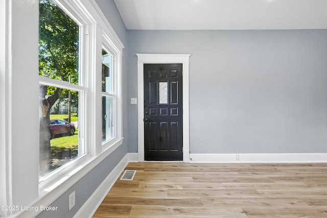 220 N 39th St, Louisville, KY 40212 - entrance foyer featuring light wood-style floors and baseboards