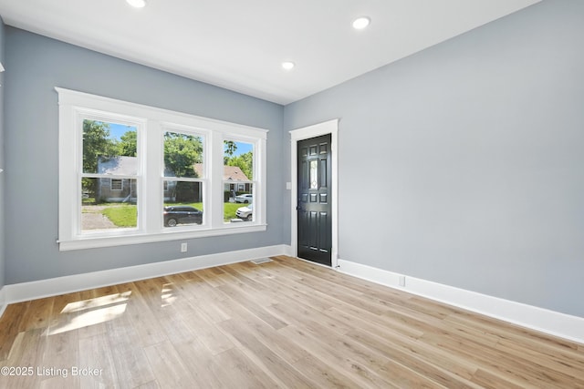 220 N 39th St, Louisville, KY 40212 - unfurnished room with light wood finished floors and recessed lighting