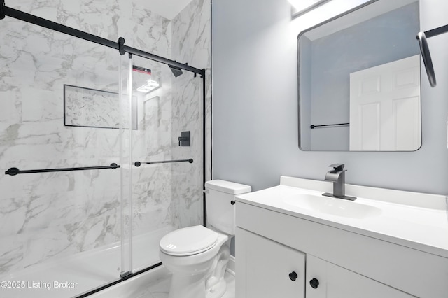 220 N 39th St, Louisville, KY 40212 - bathroom with vanity, a marble finish shower, and marble finish flooring