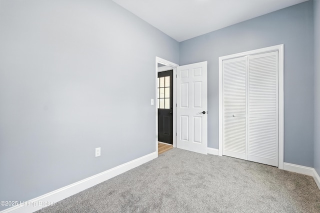 220 N 39th St, Louisville, KY 40212 - unfurnished bedroom featuring carpet flooring and a closet