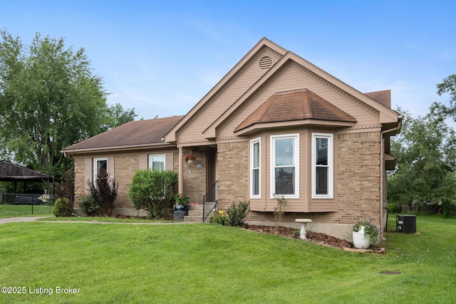 6800 Beard Ct, Louisville, KY 40228 - ranch-style home with brick siding and a front yard