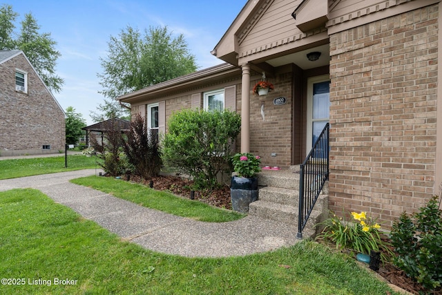 6800 Beard Ct, Louisville, KY 40228 - entrance to property with brick siding and a yard