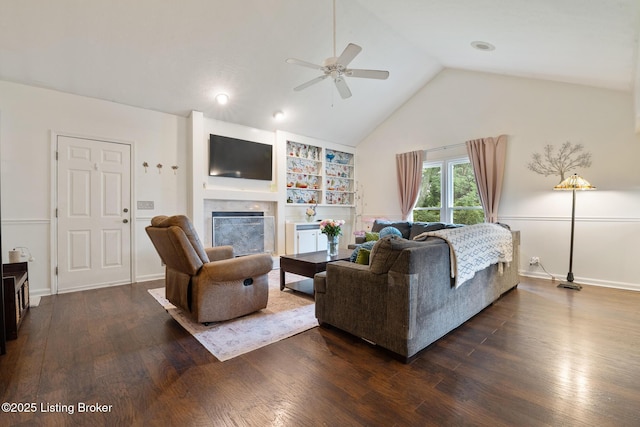 6800 Beard Ct, Louisville, KY 40228 - living room featuring a fireplace, a ceiling fan, dark wood-type flooring, and high vaulted ceiling