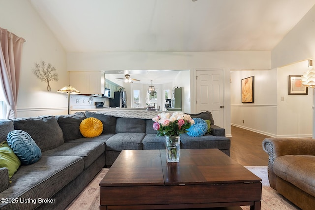 6800 Beard Ct, Louisville, KY 40228 - living area with lofted ceiling, light wood finished floors, and a ceiling fan