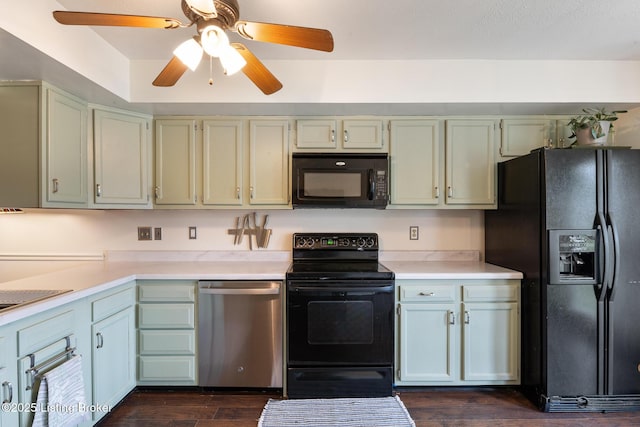 6800 Beard Ct, Louisville, KY 40228 - kitchen with black appliances, light countertops, dark wood-style floors, and ceiling fan