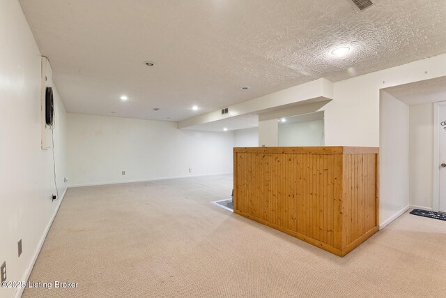 6800 Beard Ct, Louisville, KY 40228 - finished basement featuring light carpet, a dry bar, and recessed lighting