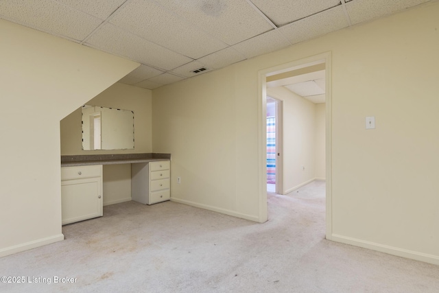 6800 Beard Ct, Louisville, KY 40228 - unfurnished office with a paneled ceiling, built in study area, and light carpet