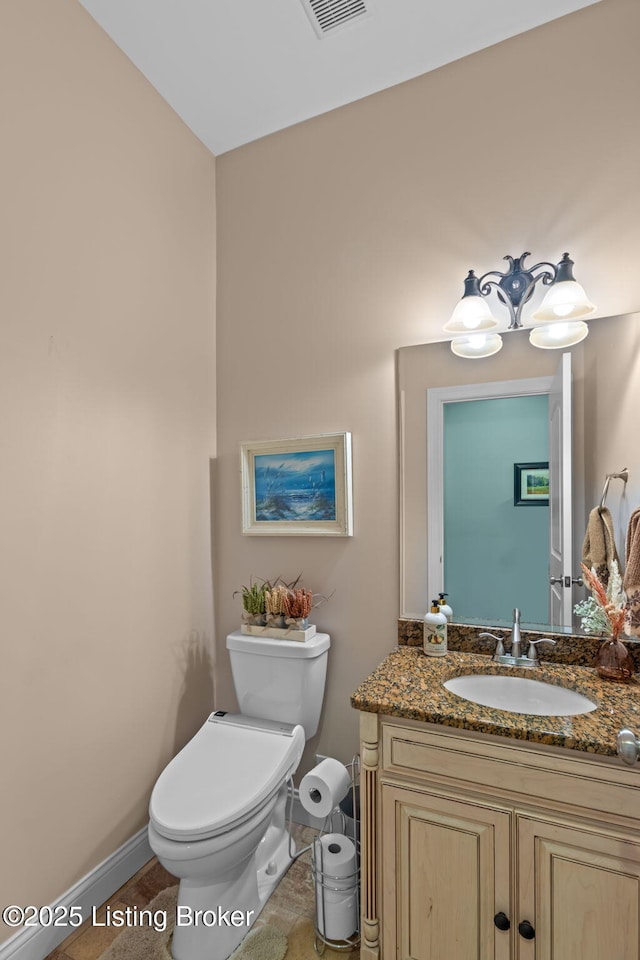 4225 Pleasant Glen Dr, Louisville, KY 40299 - half bath with vanity, toilet, and baseboards