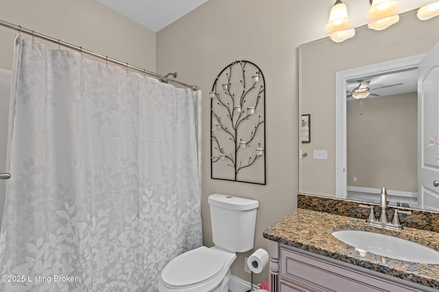 4225 Pleasant Glen Dr, Louisville, KY 40299 - bathroom featuring vanity, toilet, a ceiling fan, and a shower with curtain