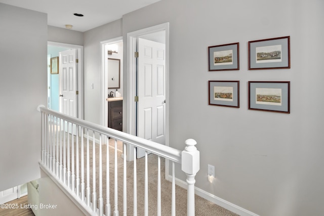 7408 Floydsburg Rd, Crestwood, KY 40014 - hall featuring baseboards and an upstairs landing