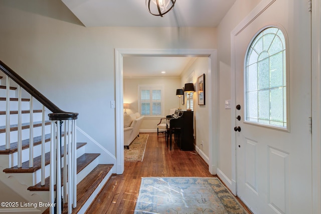 2417 Meadow Rd, Seneca Gardens, KY 40205 - foyer entrance featuring hardwood / wood-style floors, stairs, baseboards, and ornamental molding