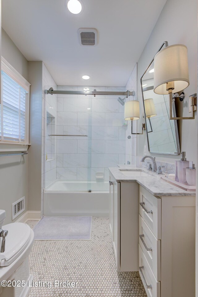 2417 Meadow Rd, Seneca Gardens, KY 40205 - bathroom with toilet, vanity, tub / shower combination, and tile patterned flooring