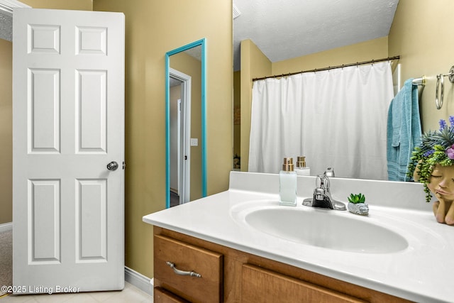 111 Emory Ct, Bardstown, KY 40004 - full bath featuring vanity, a textured ceiling, and baseboards