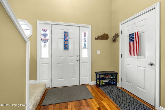 111 Emory Ct, Bardstown, KY 40004 - foyer entrance with dark wood finished floors, baseboards, and a high ceiling