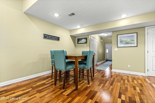 111 Emory Ct, Bardstown, KY 40004 - dining area with baseboards, wood finished floors, a textured ceiling, and recessed lighting