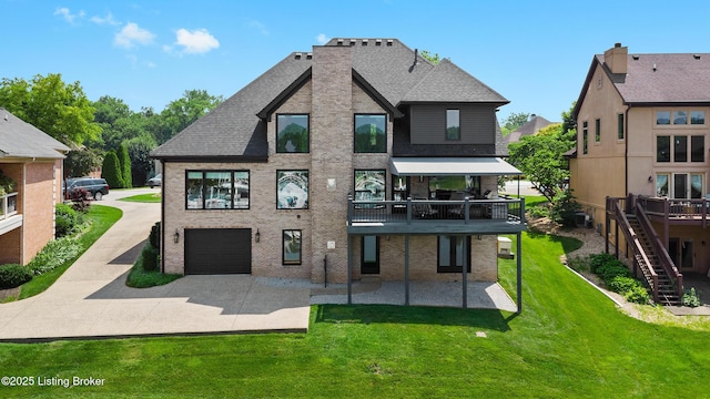 5404 River Creek Ct, Prospect, KY 40059 - back of house featuring driveway, a lawn, brick siding, a garage, and a deck