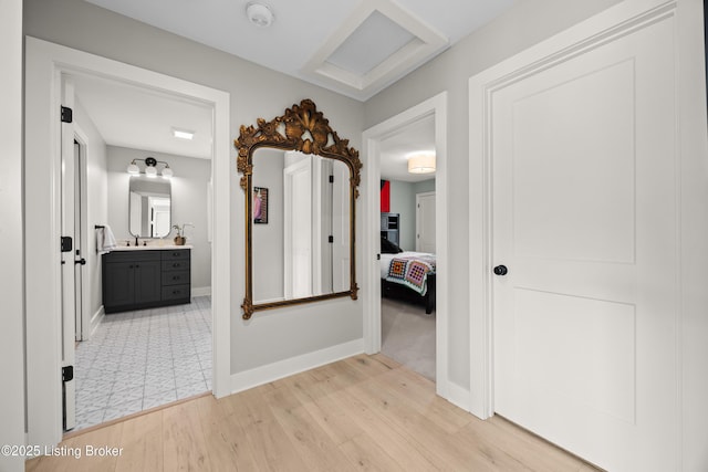 5404 River Creek Ct, Prospect, KY 40059 - hall with a sink and light wood-style floors