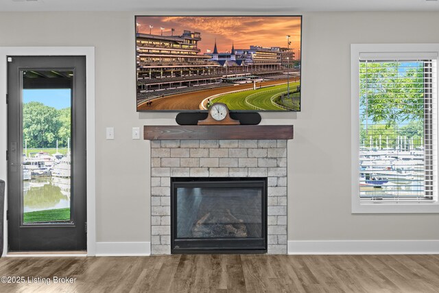 5404 River Creek Ct, Prospect, KY 40059 - detailed view of wood finished floors and a brick fireplace