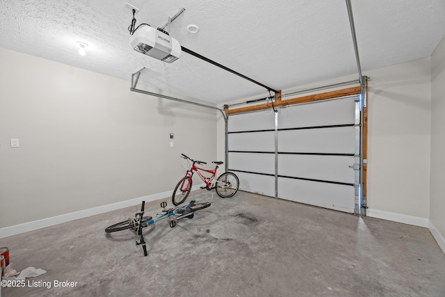 5404 River Creek Ct, Prospect, KY 40059 - garage with a garage door opener and baseboards
