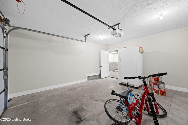 5404 River Creek Ct, Prospect, KY 40059 - garage featuring freestanding refrigerator and a garage door opener