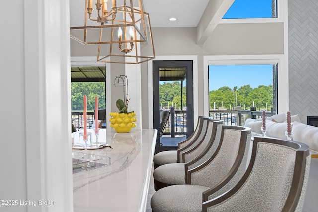 5404 River Creek Ct, Prospect, KY 40059 - dining area featuring a chandelier and healthy amount of natural light