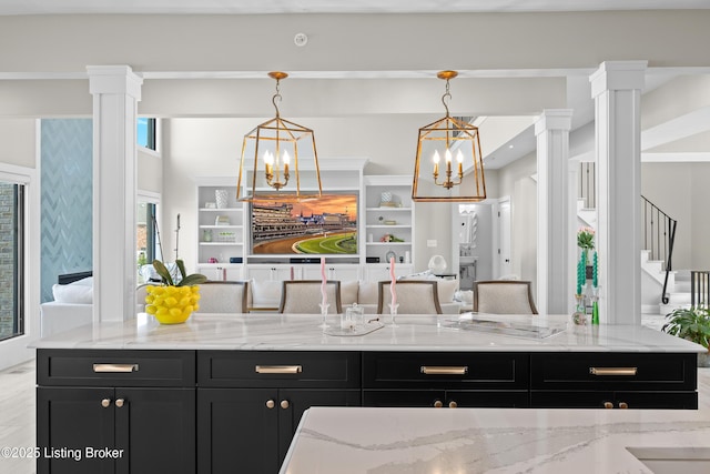 5404 River Creek Ct, Prospect, KY 40059 - kitchen featuring dark cabinetry, open floor plan, and a chandelier