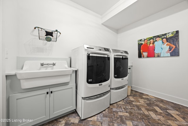 5404 River Creek Ct, Prospect, KY 40059 - laundry room featuring washer and dryer, dark stone finish floors, and cabinet space