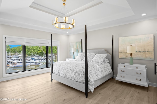 5404 River Creek Ct, Prospect, KY 40059 - bedroom featuring a tray ceiling, a chandelier, light wood-style flooring, and recessed lighting