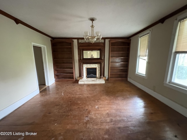 1535 Bardstown Rd, Hodgenville, KY 42748 - unfurnished living room with crown molding, a chandelier, a fireplace, wood finished floors, and baseboards