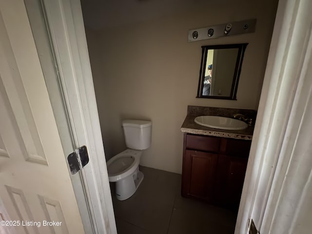 1535 Bardstown Rd, Hodgenville, KY 42748 - bathroom featuring vanity, toilet, and tile patterned flooring