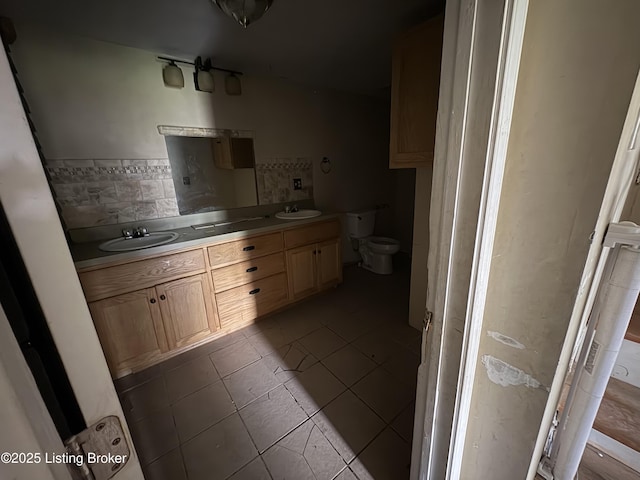 1535 Bardstown Rd, Hodgenville, KY 42748 - full bath with toilet, double vanity, and tile patterned floors