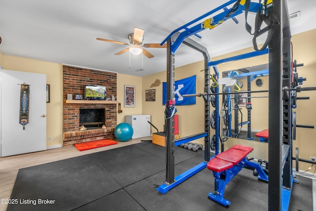 7401 Maria Ave, Louisville, KY 40222 - exercise area featuring a ceiling fan and a brick fireplace