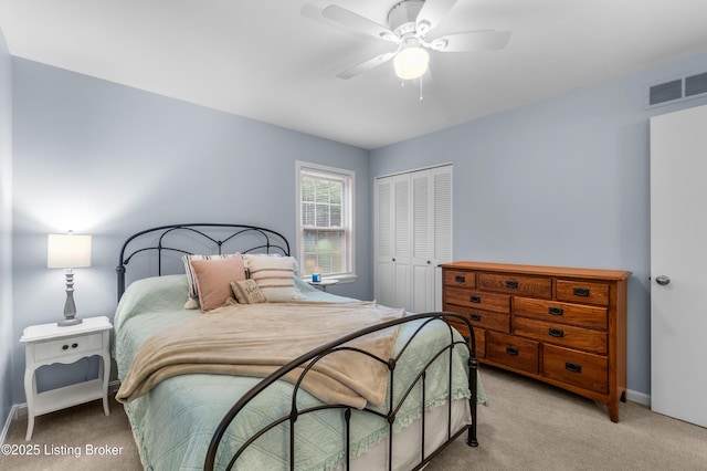 7401 Maria Ave, Louisville, KY 40222 - bedroom featuring a closet, light colored carpet, and a ceiling fan