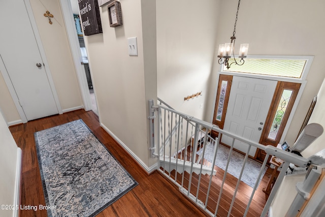 7401 Maria Ave, Louisville, KY 40222 - foyer entrance with wood finished floors, a chandelier, and a high ceiling