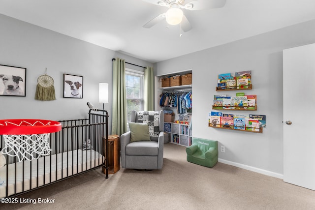 7401 Maria Ave, Louisville, KY 40222 - carpeted bedroom with a closet, a crib, and ceiling fan
