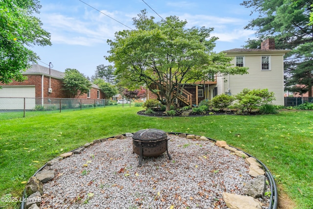 7401 Maria Ave, Louisville, KY 40222 - view of yard with a fire pit and stairs