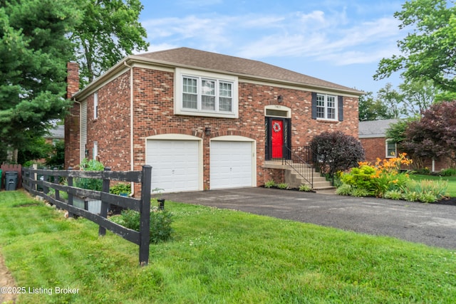 7401 Maria Ave, Louisville, KY 40222 - raised ranch featuring driveway, a garage, brick siding, and a chimney