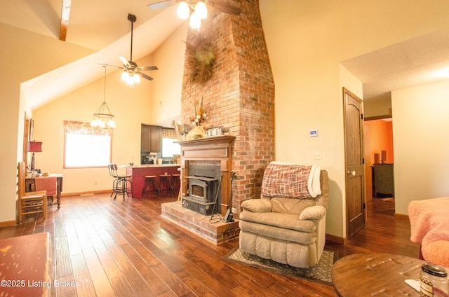 52 Lakeshore Cir, Leitchfield, KY 42754 - living room featuring a ceiling fan, high vaulted ceiling, wood-type flooring, and a wood stove