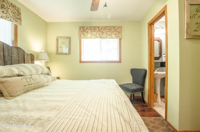 52 Lakeshore Cir, Leitchfield, KY 42754 - bedroom with connected bathroom, dark wood-type flooring, and a ceiling fan