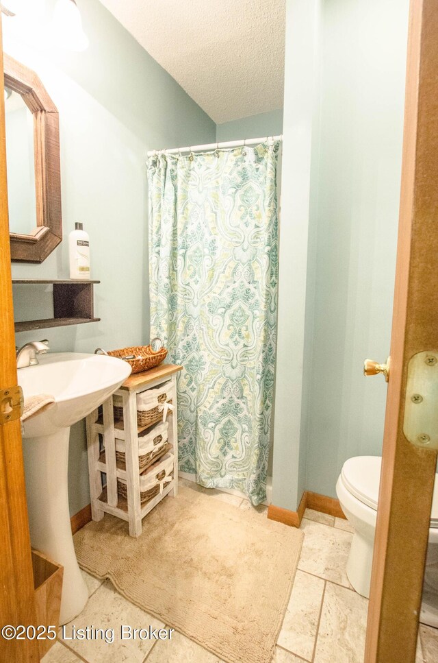 52 Lakeshore Cir, Leitchfield, KY 42754 - full bathroom with a textured ceiling and a shower with curtain
