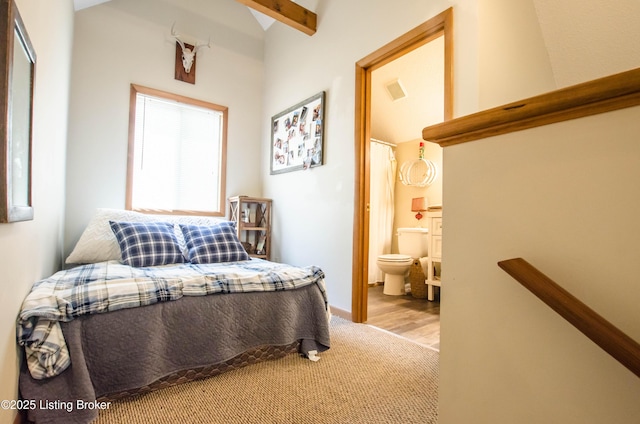 52 Lakeshore Cir, Leitchfield, KY 42754 - bedroom featuring connected bathroom, carpet floors, vaulted ceiling, and wood finished floors