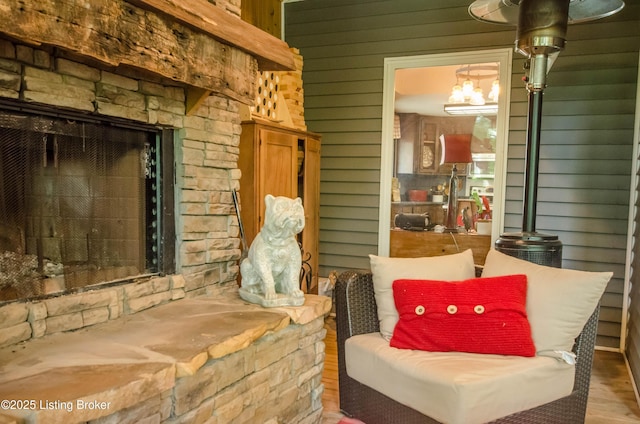 52 Lakeshore Cir, Leitchfield, KY 42754 - living area with wood finished floors, wood walls, and a chandelier