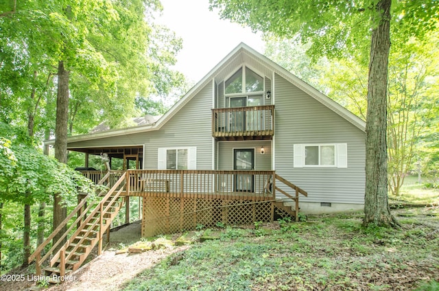 52 Lakeshore Cir, Leitchfield, KY 42754 - rear view of house with stairway, crawl space, a balcony, and a deck